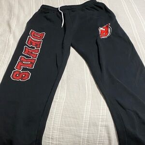 NHL Black Joggers with Red Devils Logo